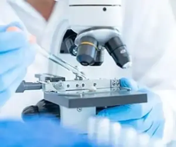 microscope biotech scientist