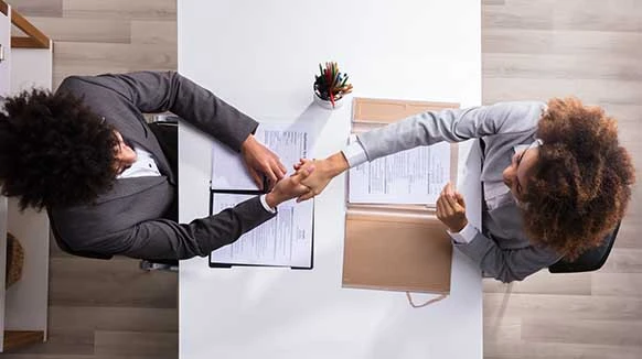 two business people shaking hands
